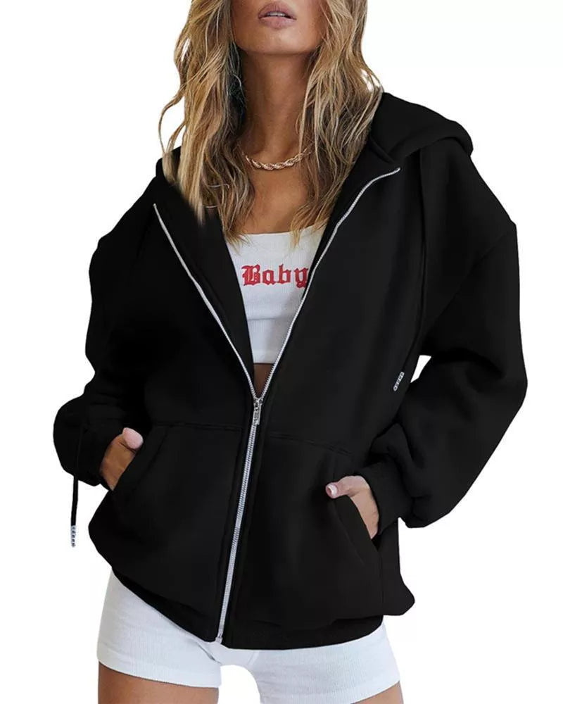 Women's solid color zipper hooded sweatshirt with drawstring, available in multiple colors and sizes.