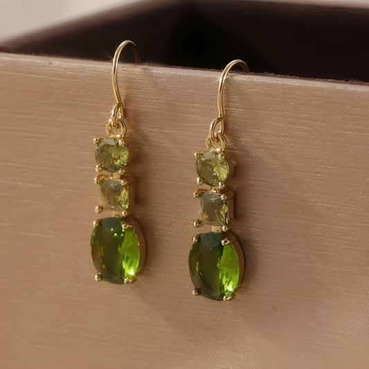 Green geometric copper earrings with a quadrilateral shape in a retro bohemian style