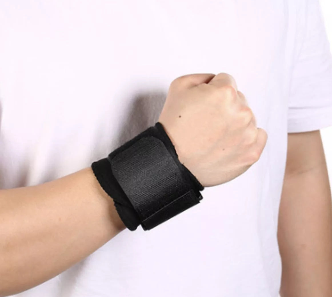 Black wrap-around wrist compression strap for sports and fitness support