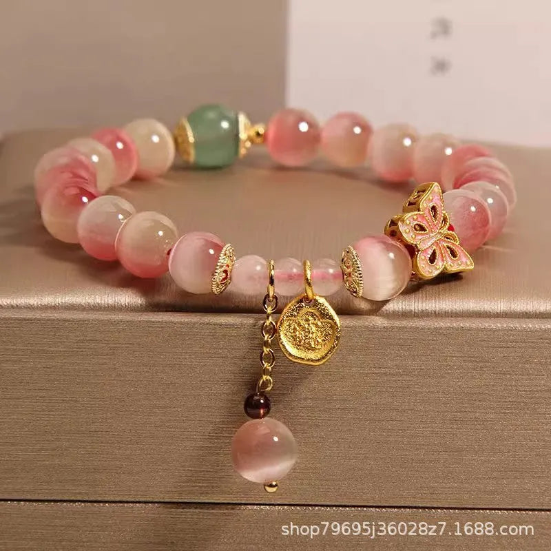 Pink opal butterfly women's bracelet with Chinese-style detailing and electroplated metal