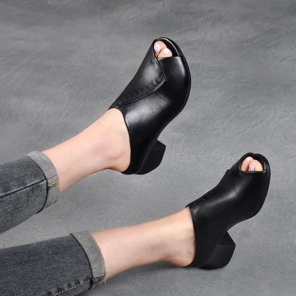 Women's black square heel peep toe slippers with a fish mouth scaffold design and rubber sole.