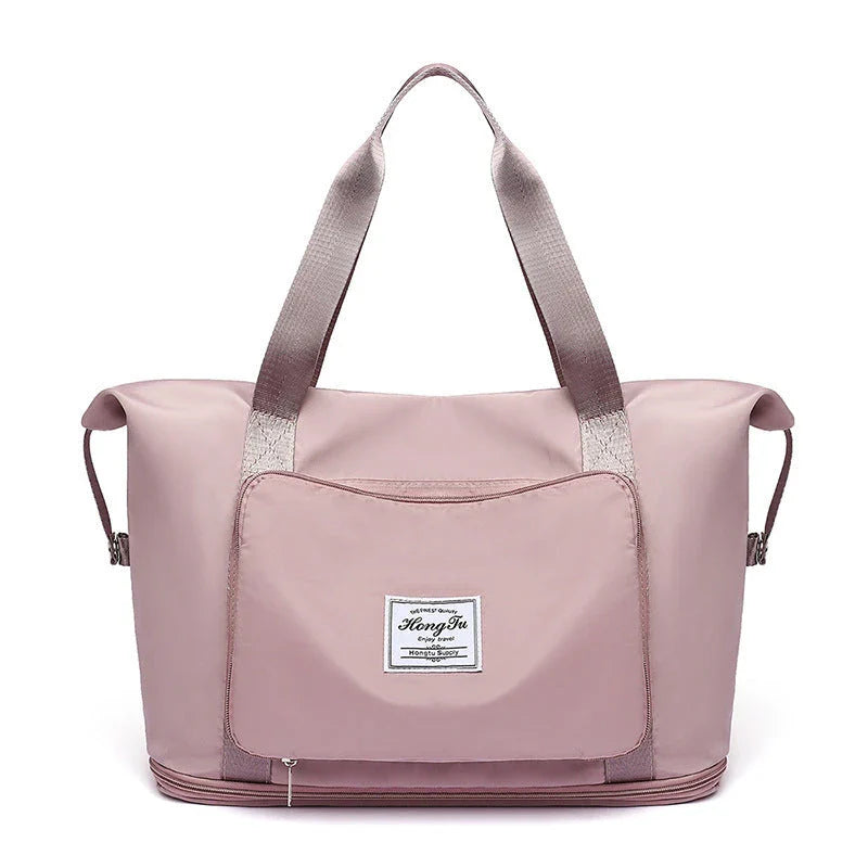 Roomy and foldable gym bag for women with waterproof Oxford fabric, multiple pockets, and wet/dry separation compartment