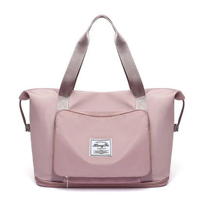 Roomy and foldable gym bag for women with waterproof Oxford fabric, multiple pockets, and wet/dry separation compartment