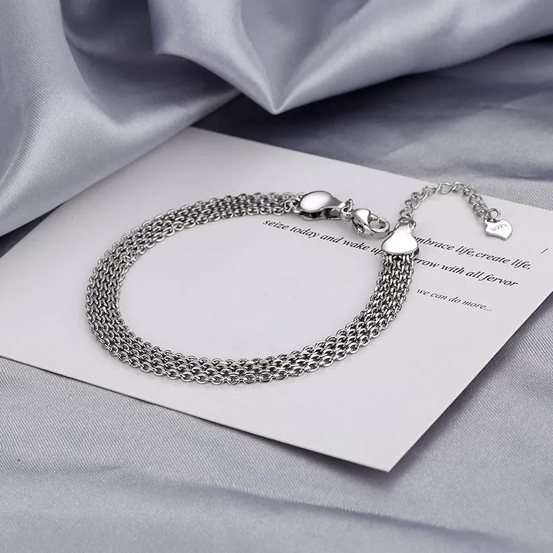 Multi-layer lace woven round beads chain bracelet in white gold color, perfect for women's fashion accessories.