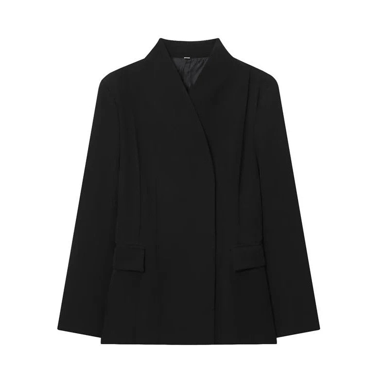 Women's black slim-fit suit jacket with regular sleeves on hanger