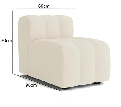 Off-white curved modular sofa with fleece fabric in corner configuration showing multiple connected pieces
