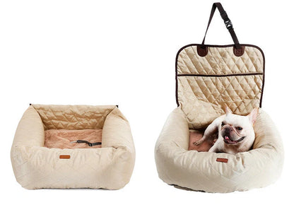 Folding pet carrier with black 900D nylon exterior and waterproof base for car seats