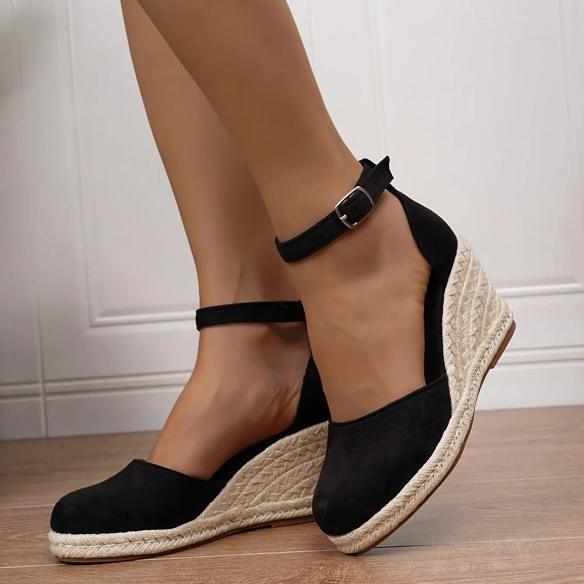 Women's apricot suede Roman style wedge sandals with adjustable buckle on a white background.