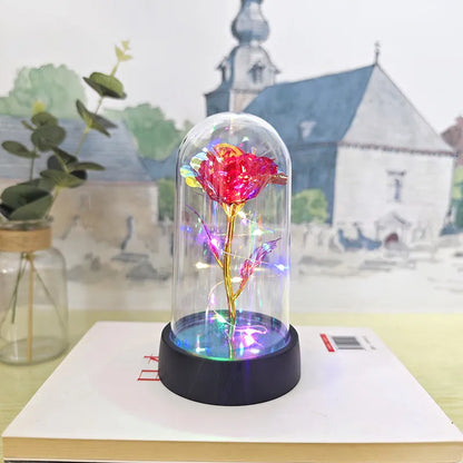 Glass cover small night lamp with plastic flowers, 15cm height, black base, and multiple light colour options