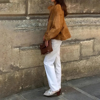 European and American retro solid colour jacket in loose fit with long sleeves, made from 100% polyester fabric.