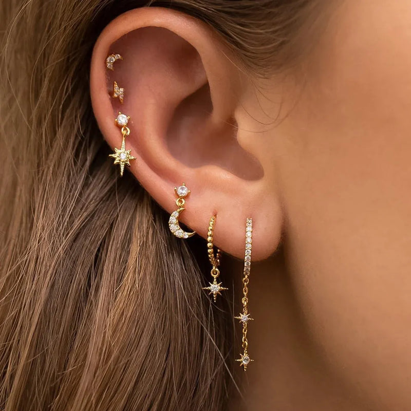 XINGX Chain Tassel Earrings fashion jewellery set for women comprising six individual zircon stud earrings in gold colour with delicate copper construction and electroplated finish for layered or single wear