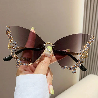 Luxurious diamond-studded butterfly sunglasses with oversized frames and a variety of color options