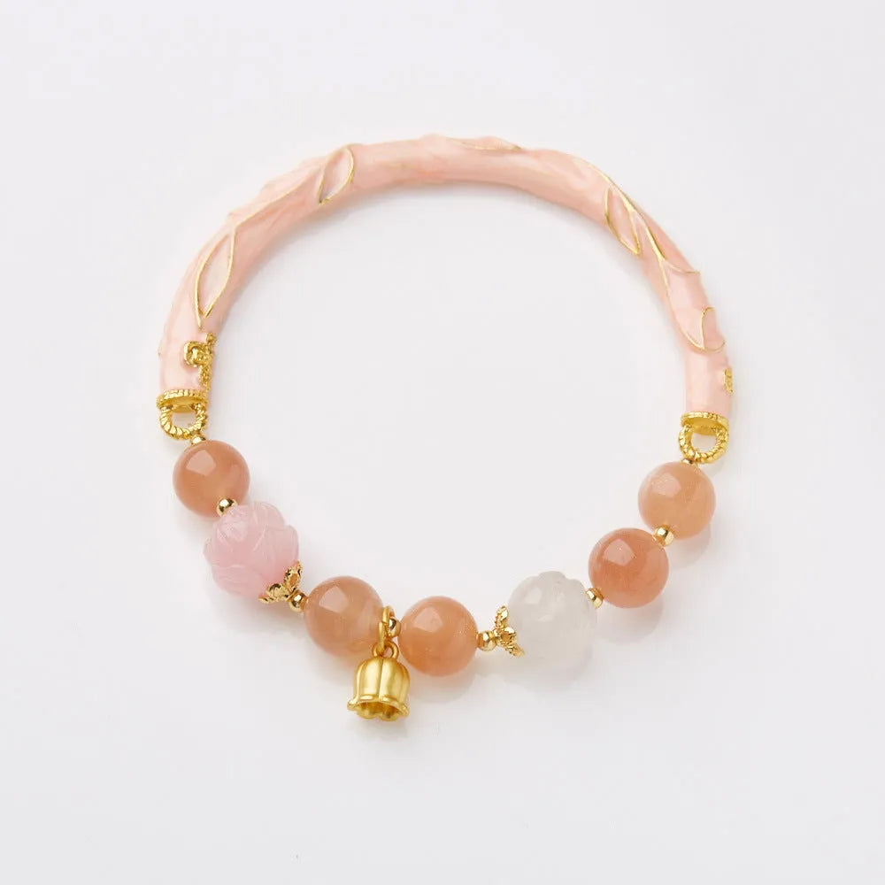 Chinese style sunstone and jade half bracelet with lily motifs measuring 20-24cm