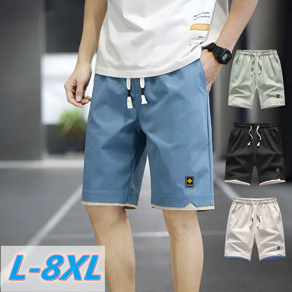 Man wearing loose straight-leg beach shorts in khaki, showcasing the South Korean style fit and micro-elastic waistband.
