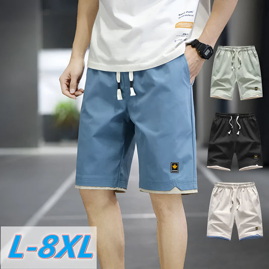 Man wearing loose straight-leg beach shorts in khaki, showcasing the South Korean style fit and micro-elastic waistband.