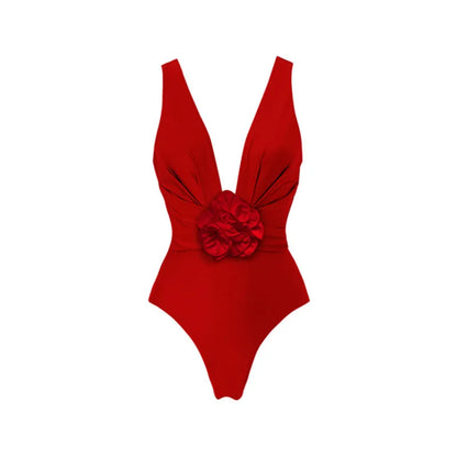 Red one-piece swimsuit with V-neck halter, open back, and a matching long skirt, with a detachable fabric flower.