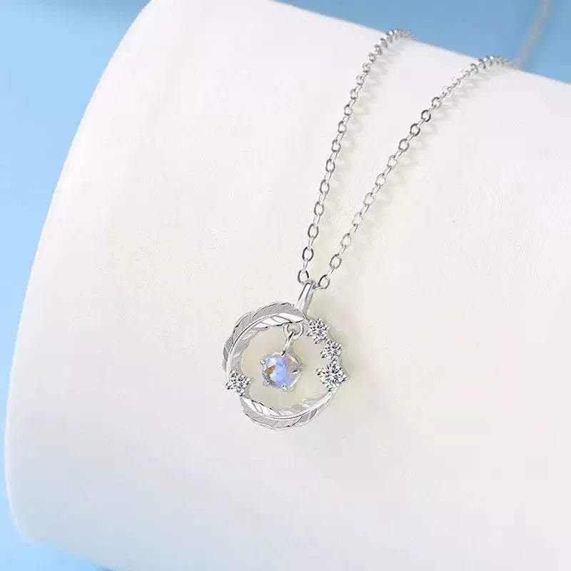 925 silver plated feather pendant necklace with color-changing moonstone bead