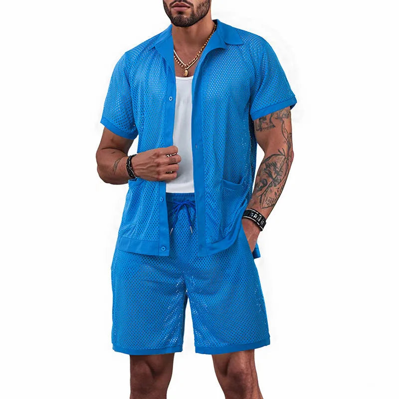 Women's lake blue see-through short sleeve cardigan and matching shorts beach cover-up set laid flat.