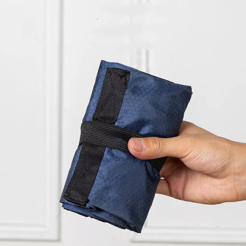 Women's waterproof foldable backpack in navy blue, perfect for outdoor and campus use