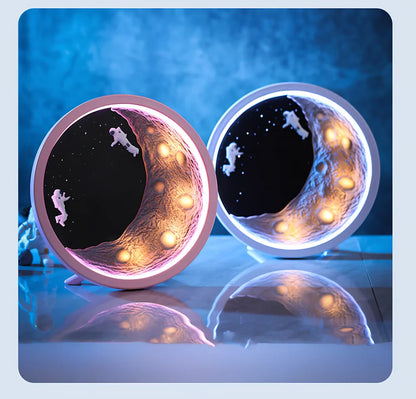 Moon Astronaut wireless Bluetooth speaker in white or pink with card insertion slot and USB port