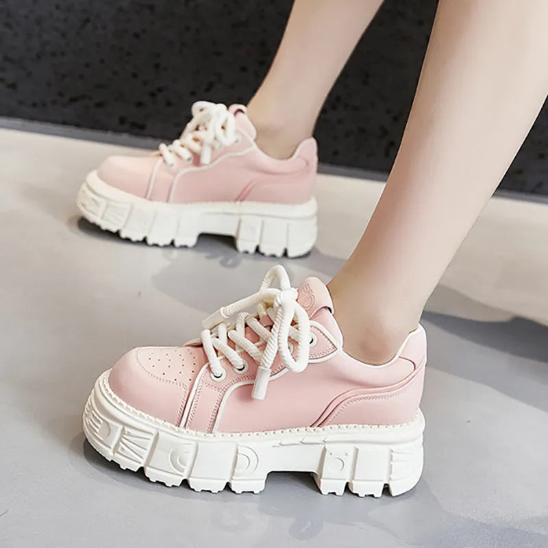 Beige leather muffin bottom shoes with a 4cm wedge sole on a neutral background.