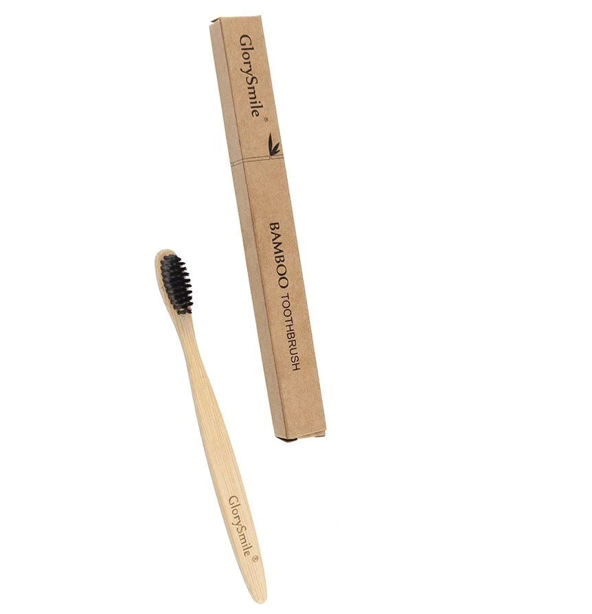 Premium bamboo toothbrush with charcoal-infused soft bristles for a gentle, eco-friendly clean