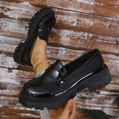 Plus size slip-on loafers with chunky platform heel in black, wine red, or green, showing rubber sole and middle top design.