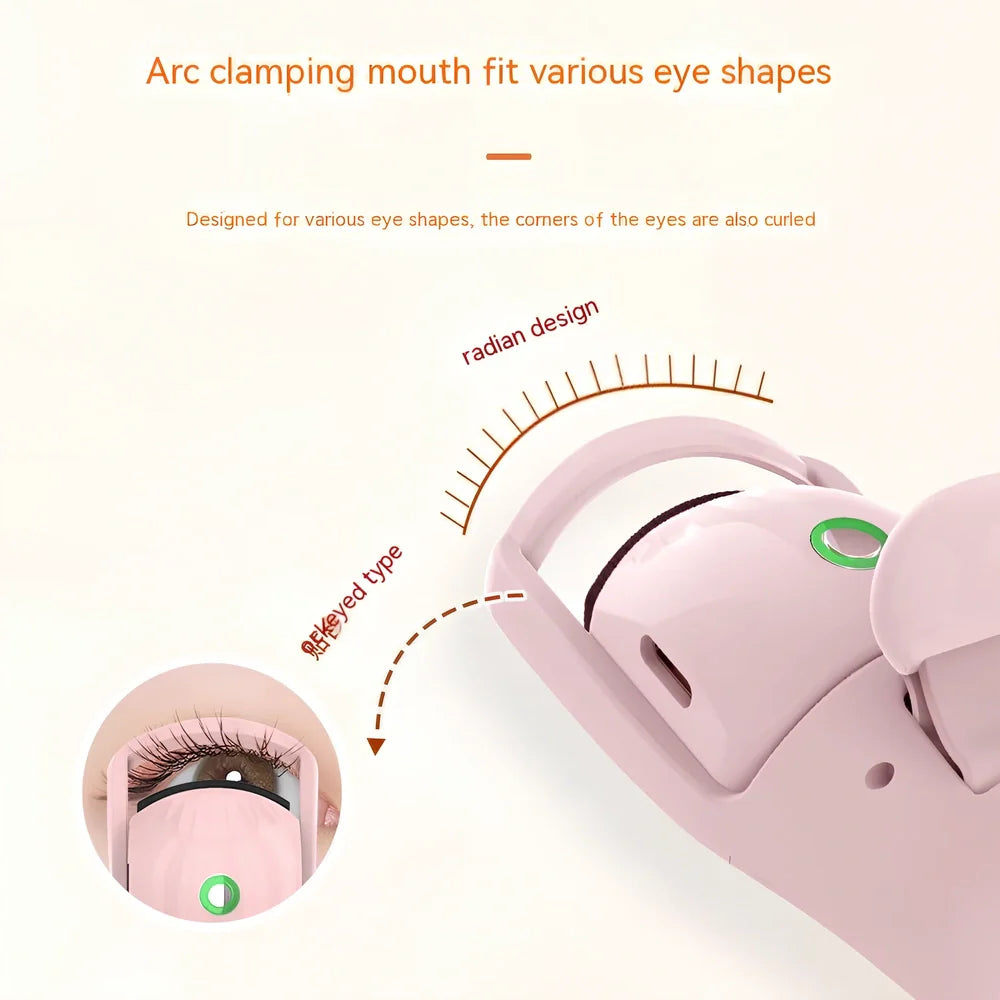 Pink and white electric eyelash curler with USB charging cable and temperature control buttons