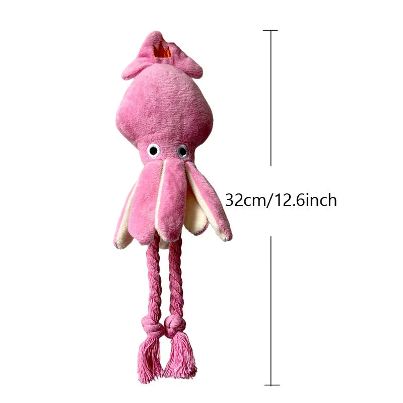 Pink squid-shaped corduroy plush dog toy with rope-like tentacles