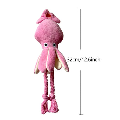 Pink squid-shaped corduroy plush dog toy with rope-like tentacles