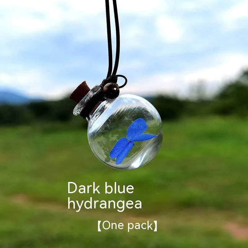 Glass fire extinguisher-shaped car perfume pendant with preserved flowers inside
