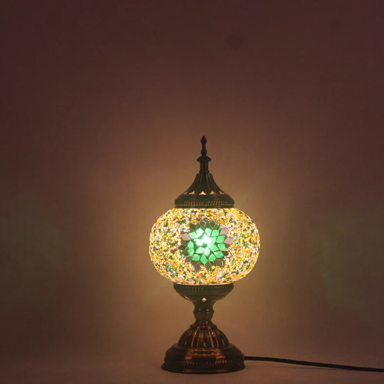 Glass table lamp with 150mm diameter shade and 330cm cord on wooden surface