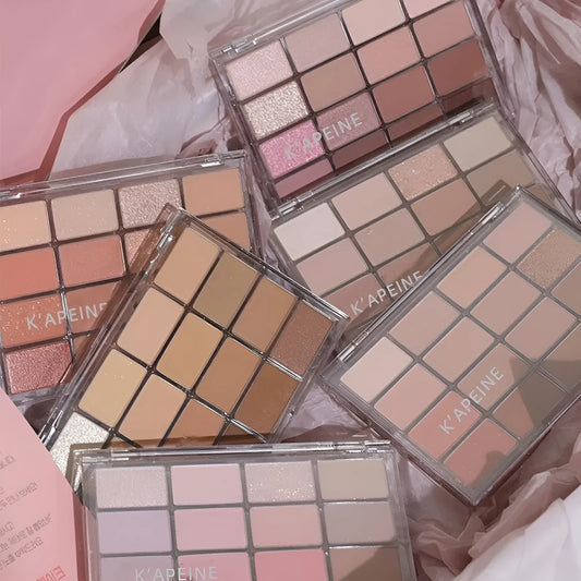 16-colour eye shadow palette showing matte and shimmer powder shades in pink, brown and lavender tones