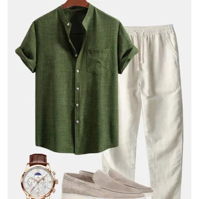 Men's blue slim-fit short-sleeved shirt with stand collar, part of a casual set with pants and shoes.