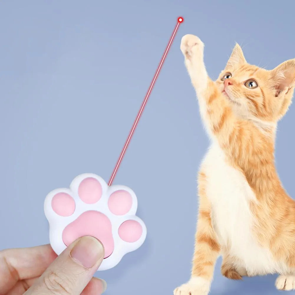 Pink and black infrared cat teaser toy with key chain measuring 5 by 2.5 centimetres