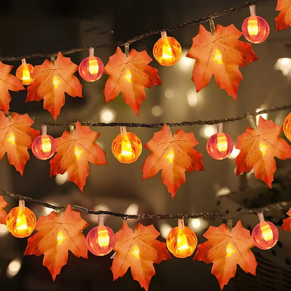 Halloween pumpkin light string with orange plastic pumpkins and warm white LED illumination