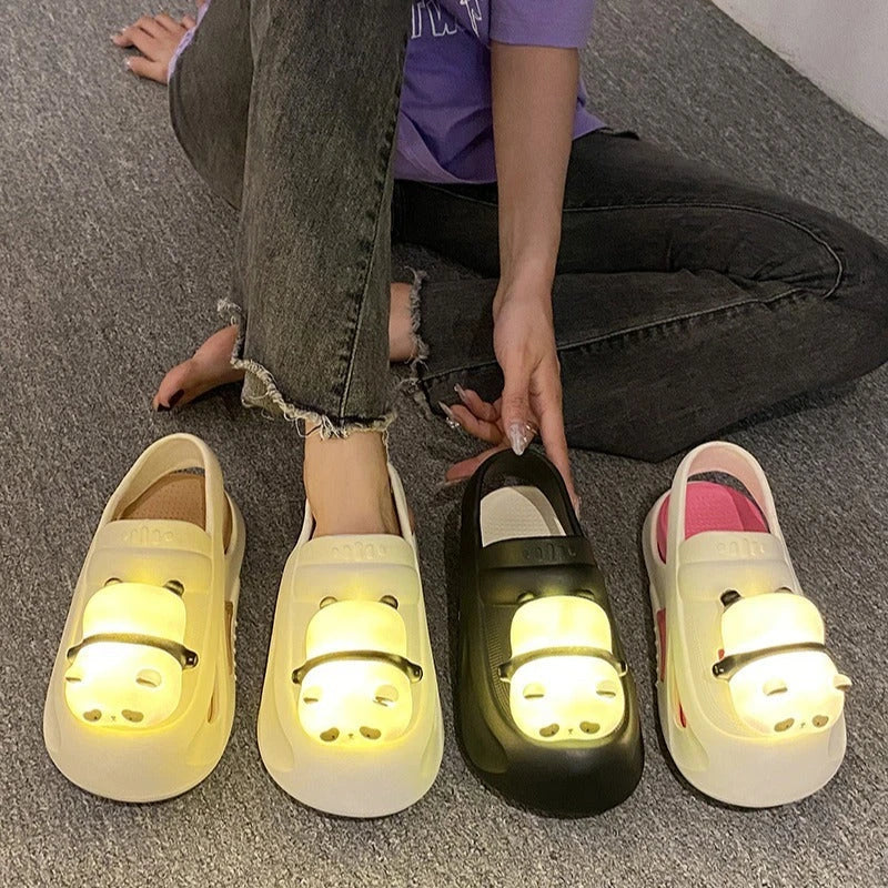 Cozy Panda Night Light Slippers with a charming panda design, built-in night light, and comfortable EVA construction