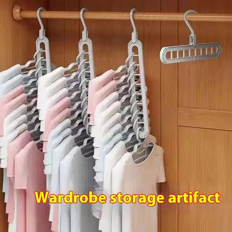 Green nine-hole folding hanger with trousers organised across nine hanging points, showing 45cm width