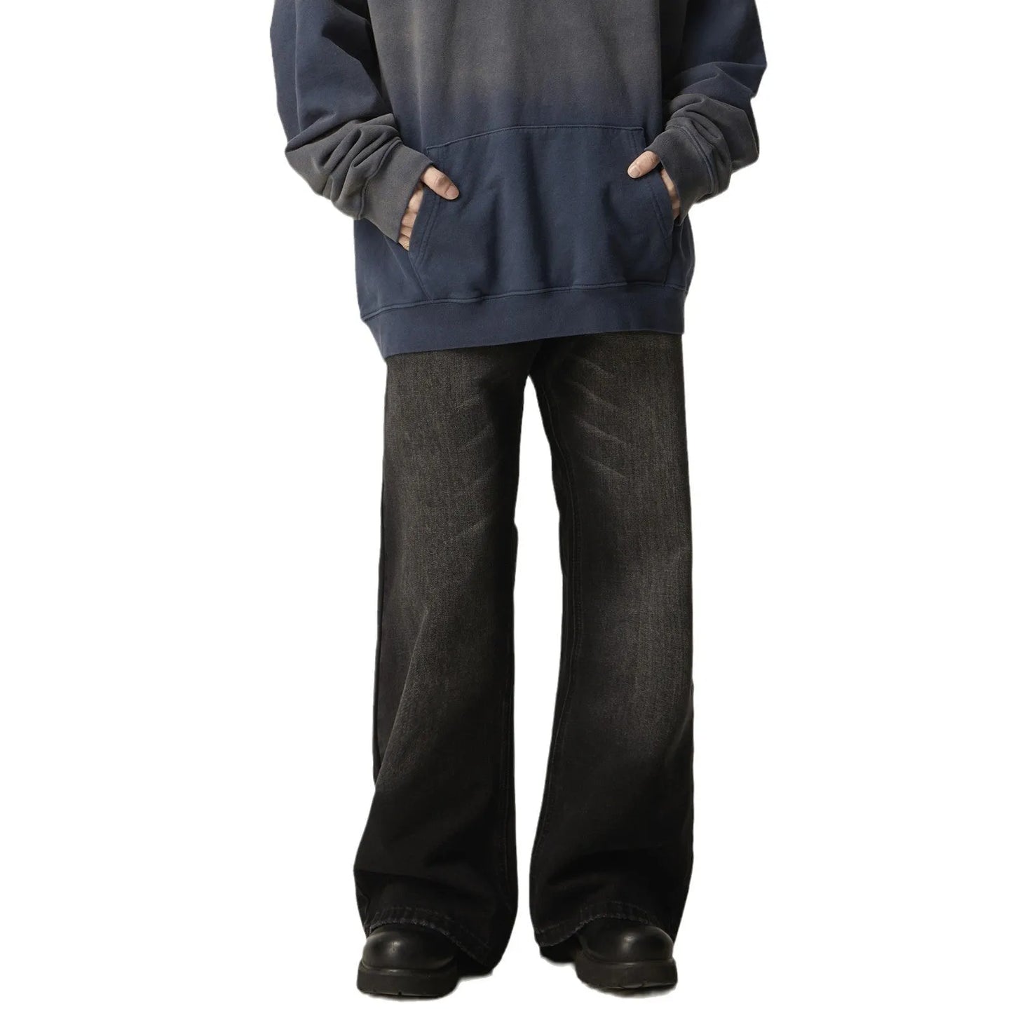Black loose straight jeans with retro styling, zipper fly, and inelastic denim fabric