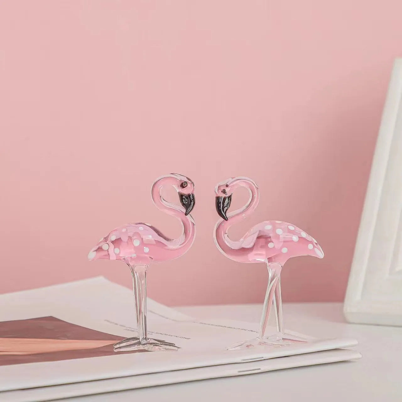 Pink crystal flamingo decorative ornament on table, 15cm tall with modern simplicity design