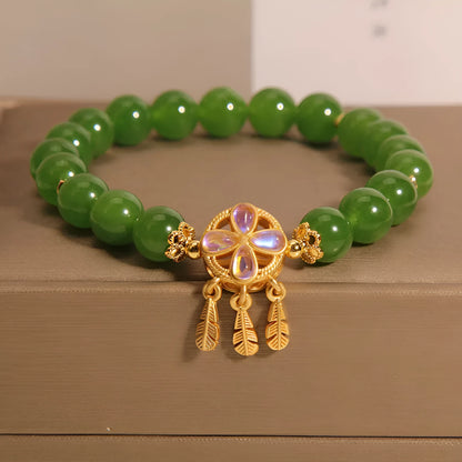 Green Jasper crystal bracelet for women with a four-leaf clover dream catcher pendant.