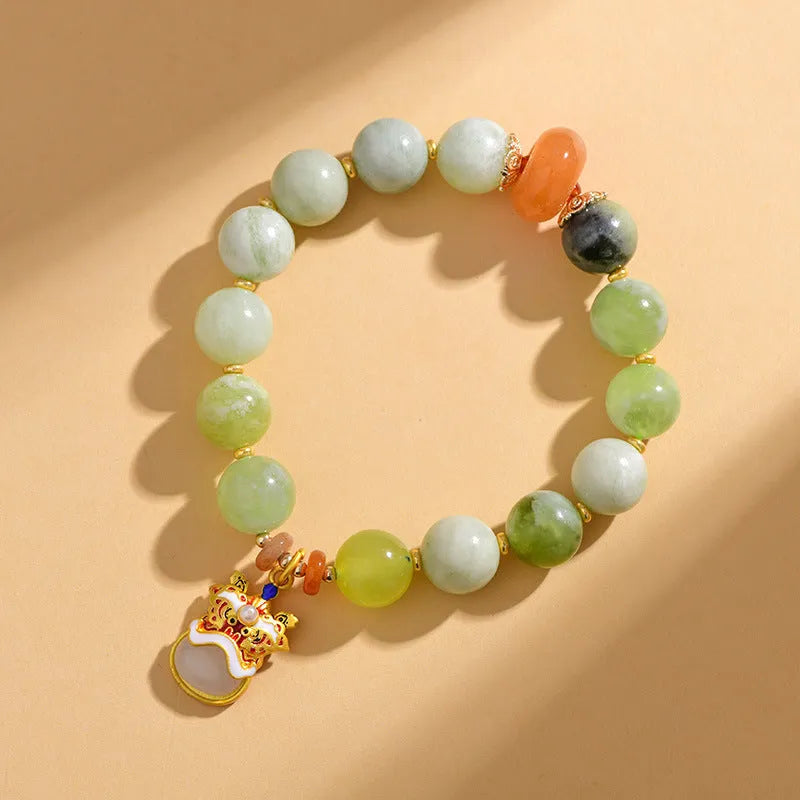 Green milk-in-water Xingshi jade pendant bracelet with geometric retro design on wrist