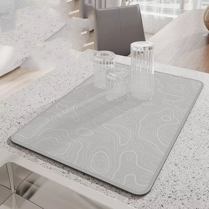 Diatomite kitchen draining mat in various colors and sizes, heat resistant and quick absorbing.