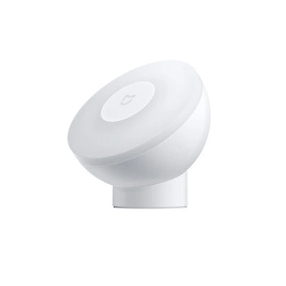 White modern bedside table lamp with human body sensor and Bluetooth connectivity, dimensions 94mm by 94mm by 71mm.