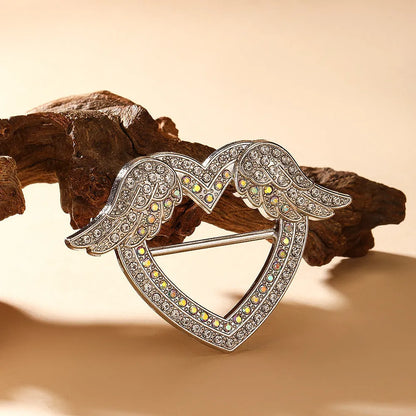 Bow-shaped waist-cinching accessory clip for high-end brooches, alloy with electroplating and diamond inlay, shown in gold, silver, or rose gold finishes.