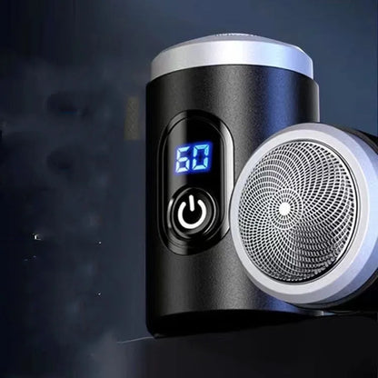 Black mini portable rechargeable shaver with USB cable and cleaning brush on a white background