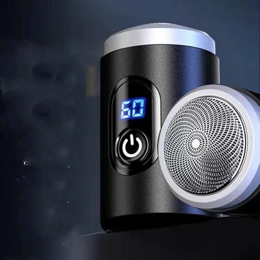 Black mini portable rechargeable shaver with USB cable and cleaning brush on a white background