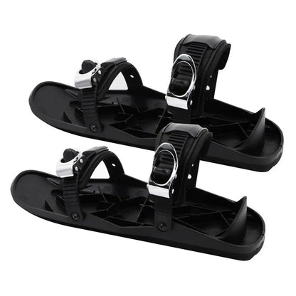 Mini short ski skates for snowboarding in black, featuring adjustable fixers and a 10 cm turning radius.