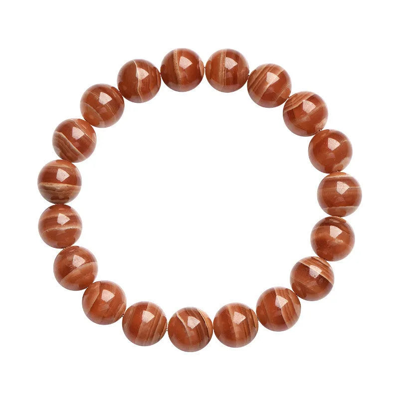 Natural old mine rhodochrosite bracelet with round geometric beads showing manganese spar colour variations