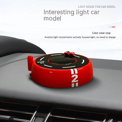 Round car-shaped solar aromatherapy decoration in black colour with USB charging cable